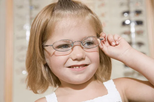 young child with glasses for a lazy eye